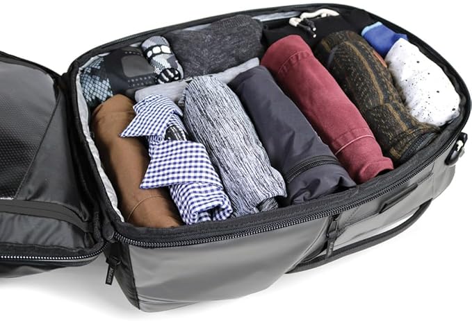 Käydä 36L Travel Backpack - Spacious Carry On Backpack with Detachable Travel Pouch, Magnetic Water Bottle Pocket, Passport and Laptop Pocket - Convertible Boot Bag for Snow Sports (Black/Gold)