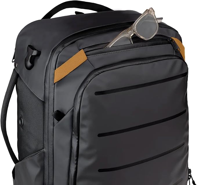 Käydä 44L Travel Backpack - Spacious Carry On Backpack with Detachable Travel Pouch, Magnetic Water Bottle Pocket, Passport and Laptop Pocket - Convertible Boot Bag for Snow Sports (Black/Gold)