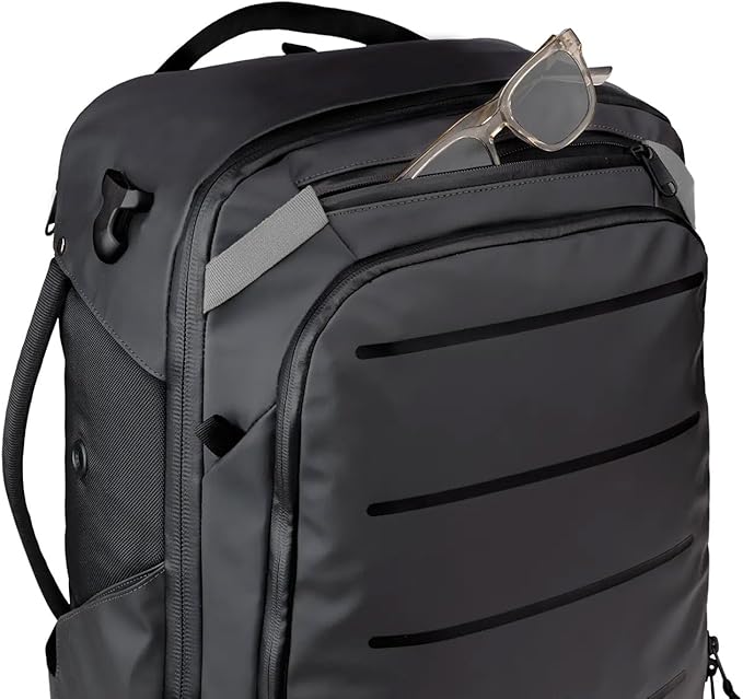 Käydä 44L Travel Backpack - Spacious Carry On Backpack with Detachable Travel Pouch, Magnetic Water Bottle Pocket, Passport and Laptop Pocket - Convertible Boot Bag for Snow Sports (Black/Silver)