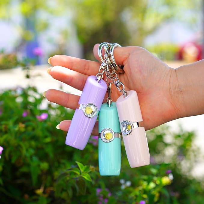 Securityman Personal Safety Alarm for Women | Self Defense Keychain (Loudest 130dB Siren and SOS Strobe Light) Everyday Security Personal Alarm Protection Device (Pink)
