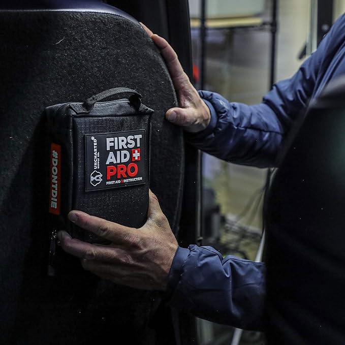 Uncharted Supply Co. First Aid Pro Kit for Emergency Preparedness Survival - Car, Backpacking, Hiking, and Camping - Compact, Lightweight, Water-Resistant - Fully Stocked